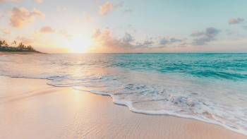 A tropical beach in the sunset © Sean Oulashin
