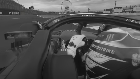 Lewis Hamilton driving his Mercedes Benz Formula 1 race car car © Formula 1