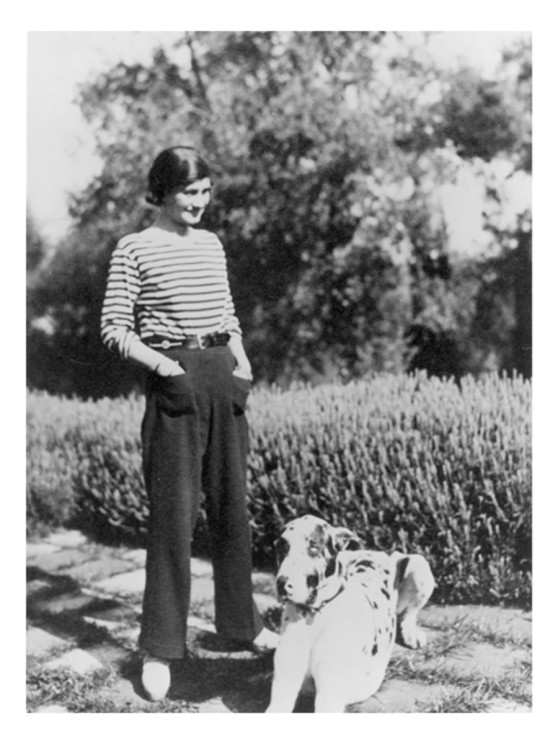 Gabrielle Chanel with her dog Gigot, at her property La Pausa at Roquebrune-Cap-Martin in the south of France, 1930 © CHANEL